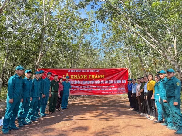 LỄ KHÁNH THÀNH CÔNG TRÌNH TUYẾN ĐƯỜNG SỎI PHÚN LIÊN ẤP 4 DẪN VÀO CHỐT CHIẾN ĐẤU DÂN QUÂN XÃ MINH TÂM